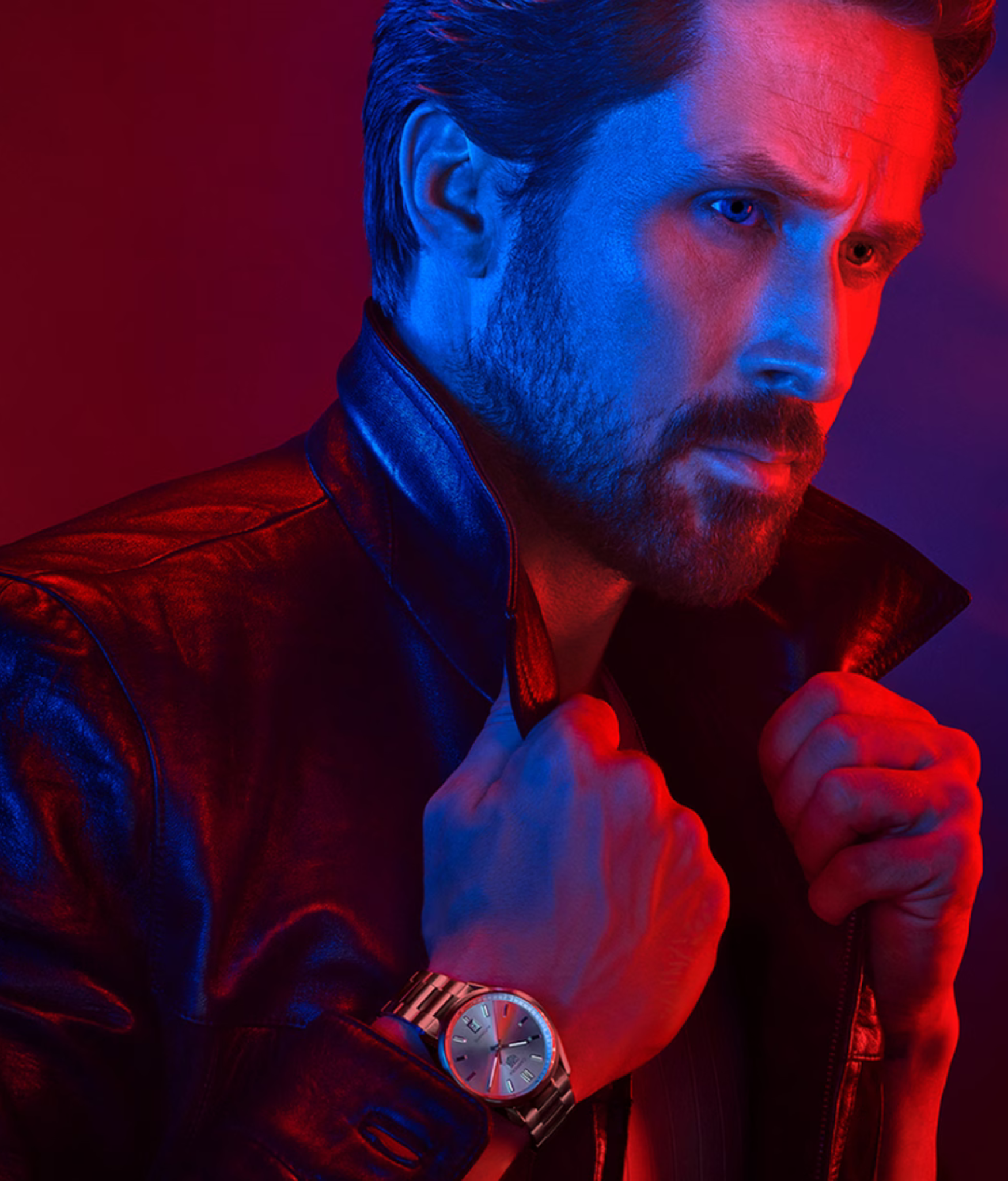 TAG Heuer brand ambassador Ryan Gosling elegantly showcases the TAG Heuer Carrera watch. Explore sophistication and style with TAG Heuer timepieces, endorsed by the renowned actor.
